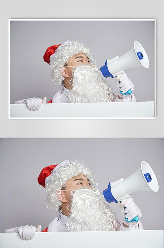 圣诞节圣诞老人手拿喇叭人物摄影图
