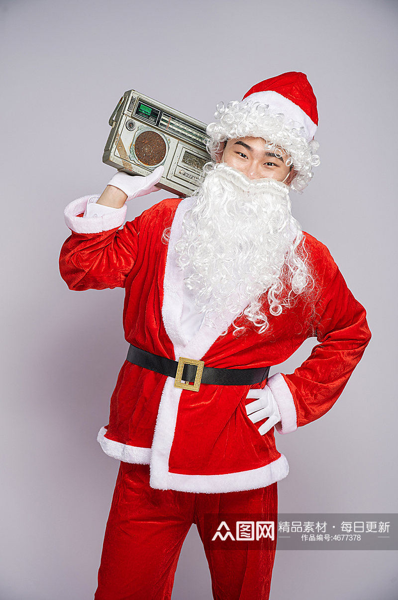 圣诞节圣诞老人肩扛音箱人物摄影图素材