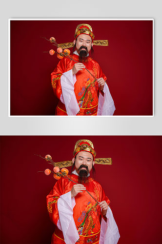新年财神爷手拿柿子人物摄影图