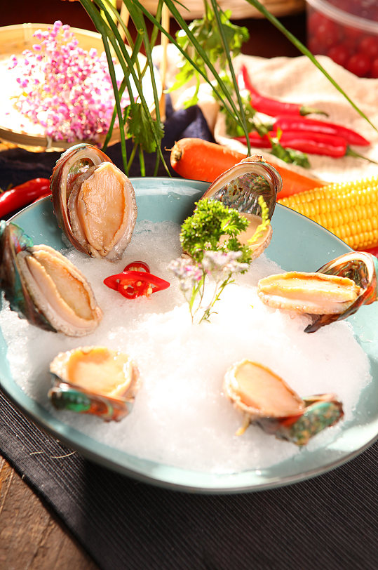 特色优质鲍鱼仔海鲜火锅美食菜品摄影图