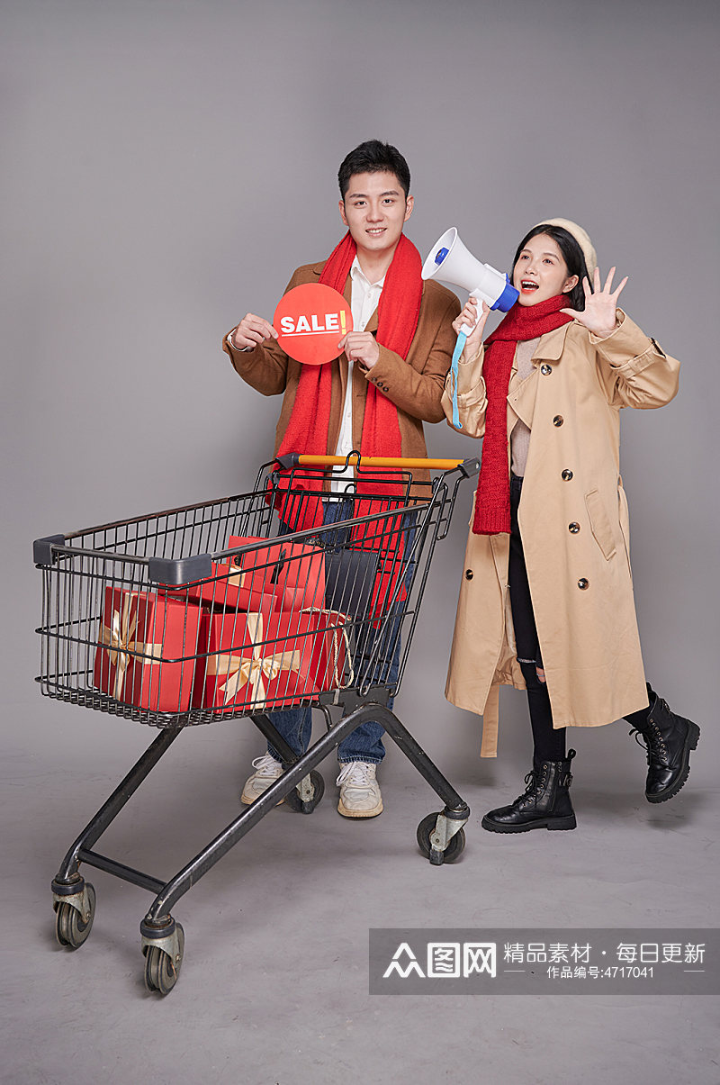 购物节秋冬情侣商场促销人物购物车摄影图片素材