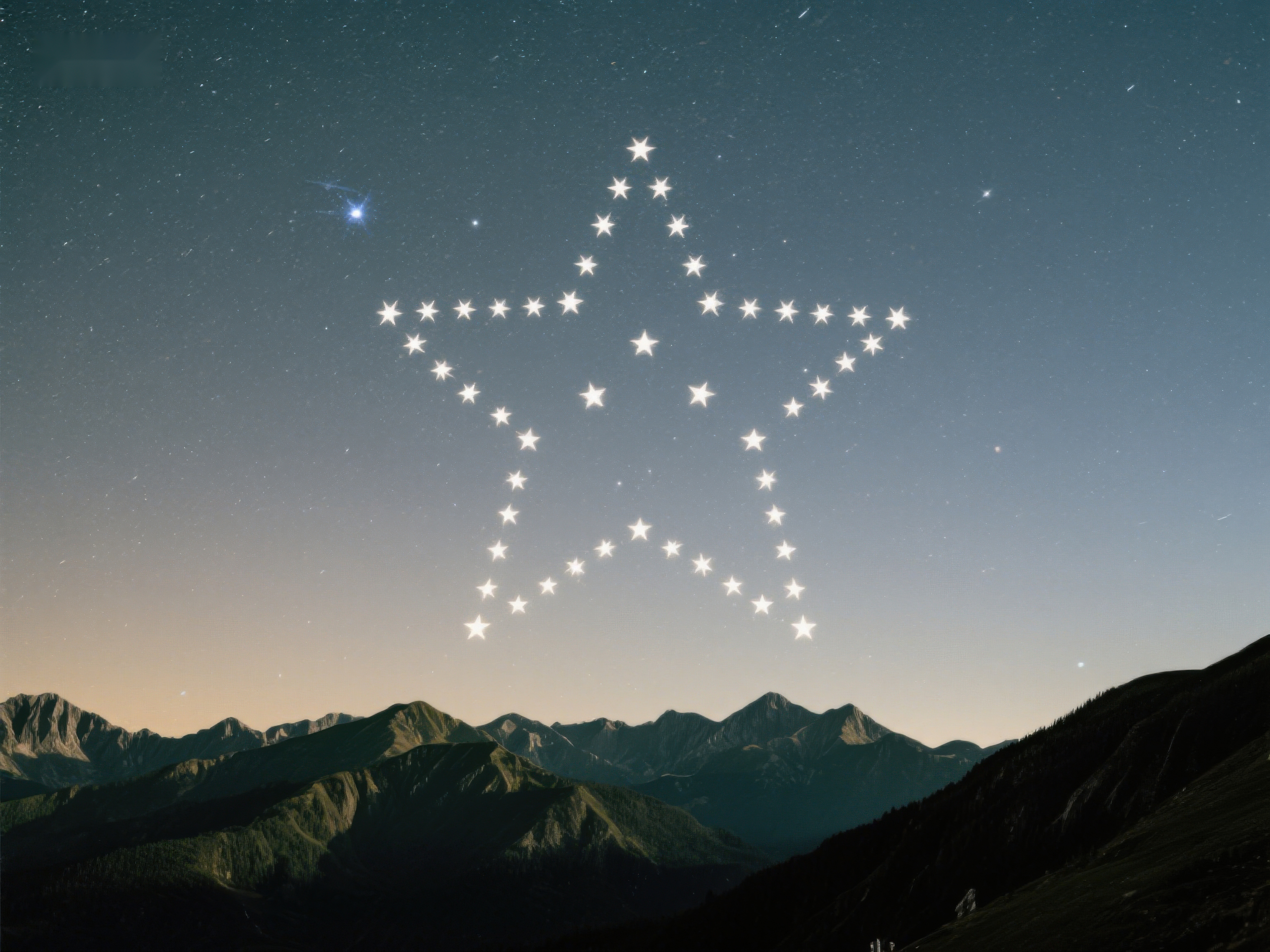星空下的山峦与星形星座素材