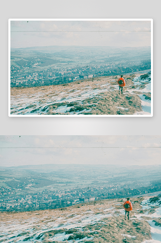 一人登高远眺雪地山谷-众图网