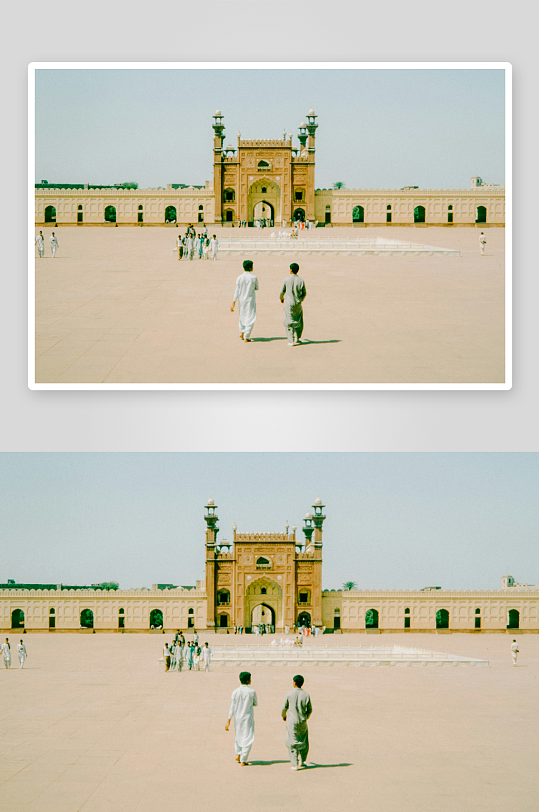 两人走向宏伟建筑庭院-众图网