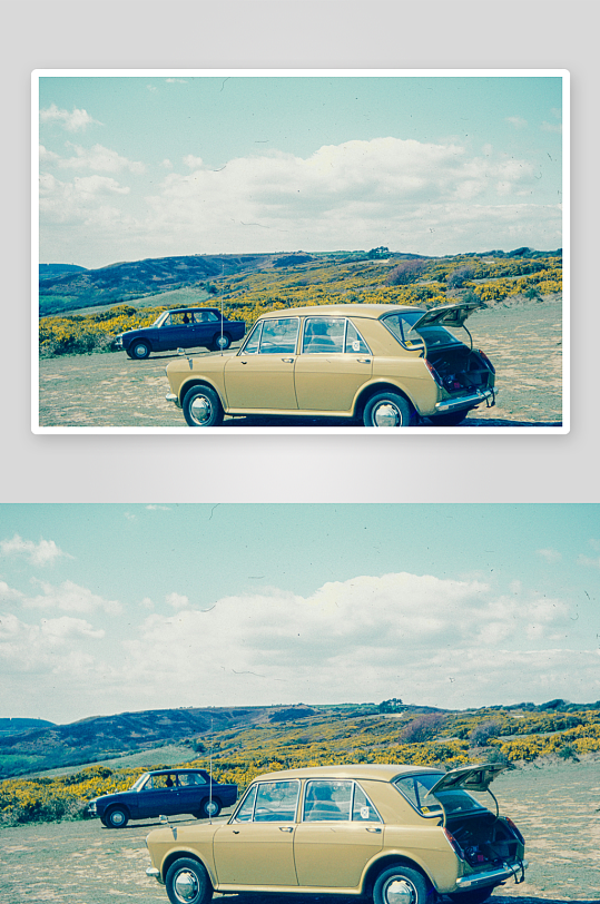 两辆老式汽车停在开阔野地-众图网