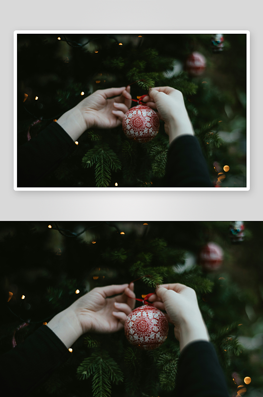 双手挂圣诞装饰球-众图网