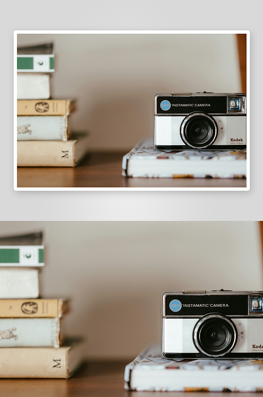 复古相机置于书本之上-众图网
