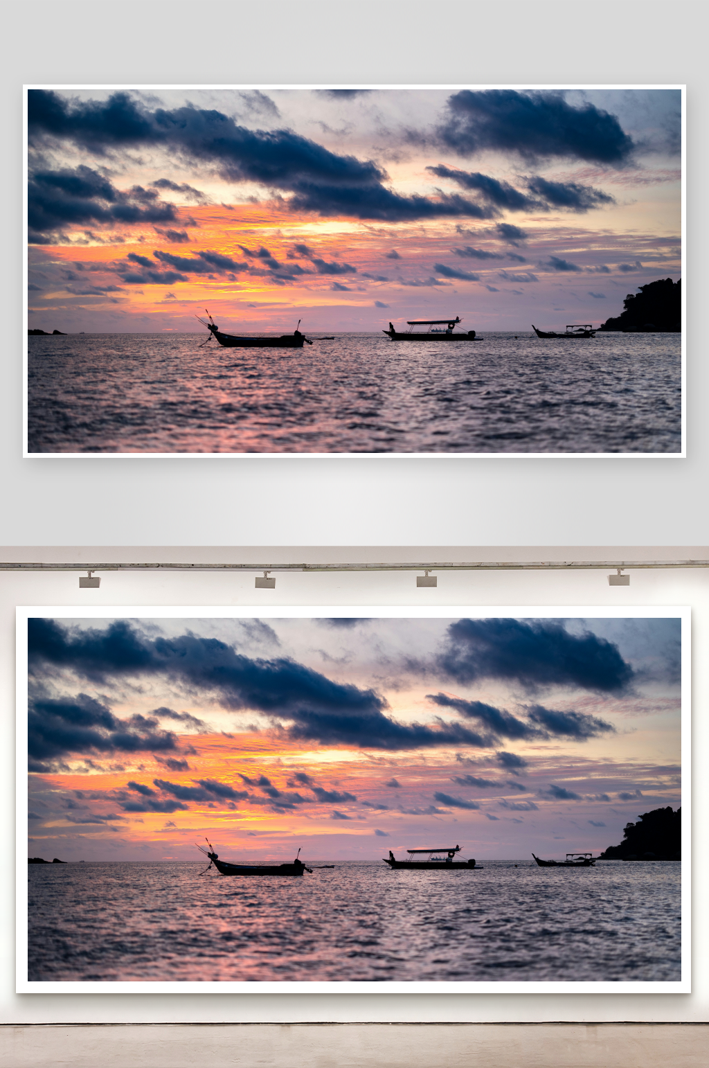 夕阳下的海面渔船剪影素材