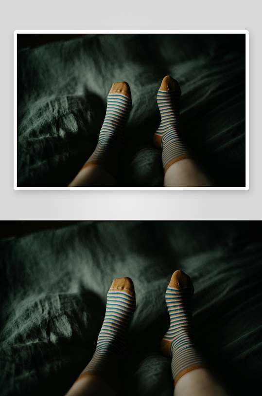 床上穿着条纹袜的双脚-众图网