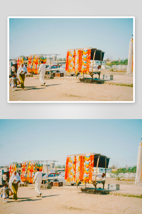 户外花环摊位与行人-众图网