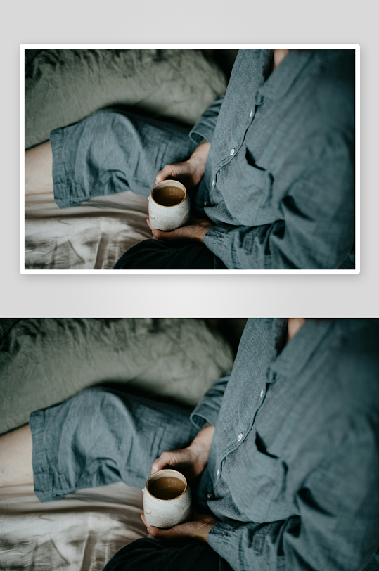 手持陶杯静坐床上-众图网