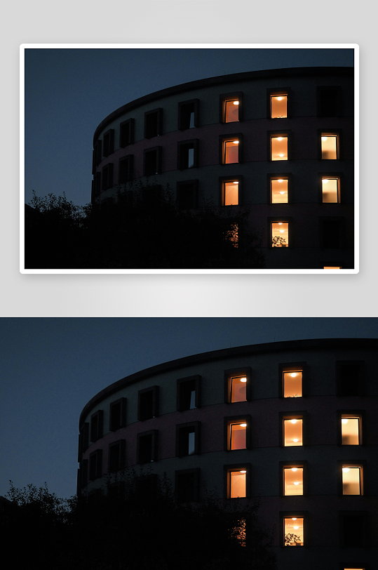 夜幕下的弧形建筑灯火通明-众图网