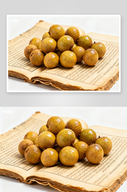 新鲜龙眼置于古书之上-众图网