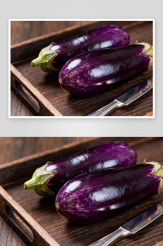 木质托盘上的两根紫茄子-众图网