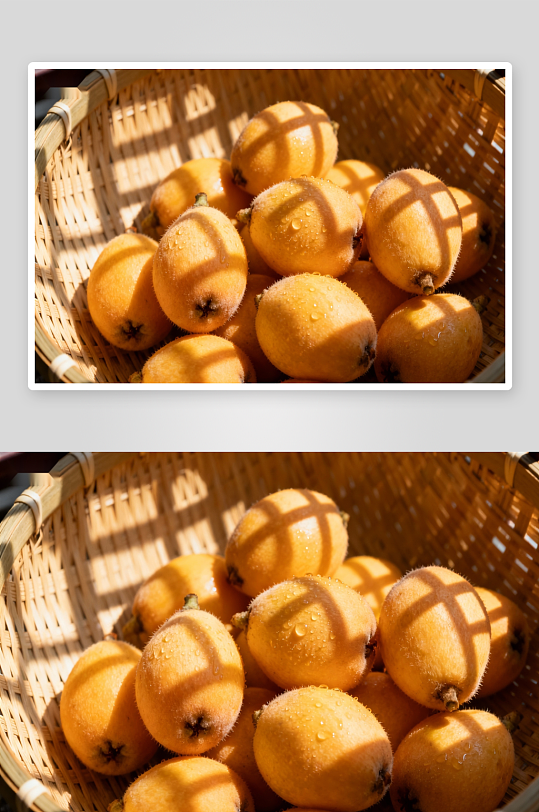 阳光下竹篮里的枇杷-众图网