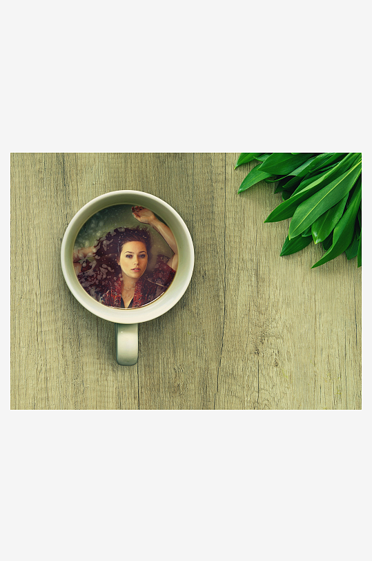 咖啡杯中女子影像与绿叶静物-众图网