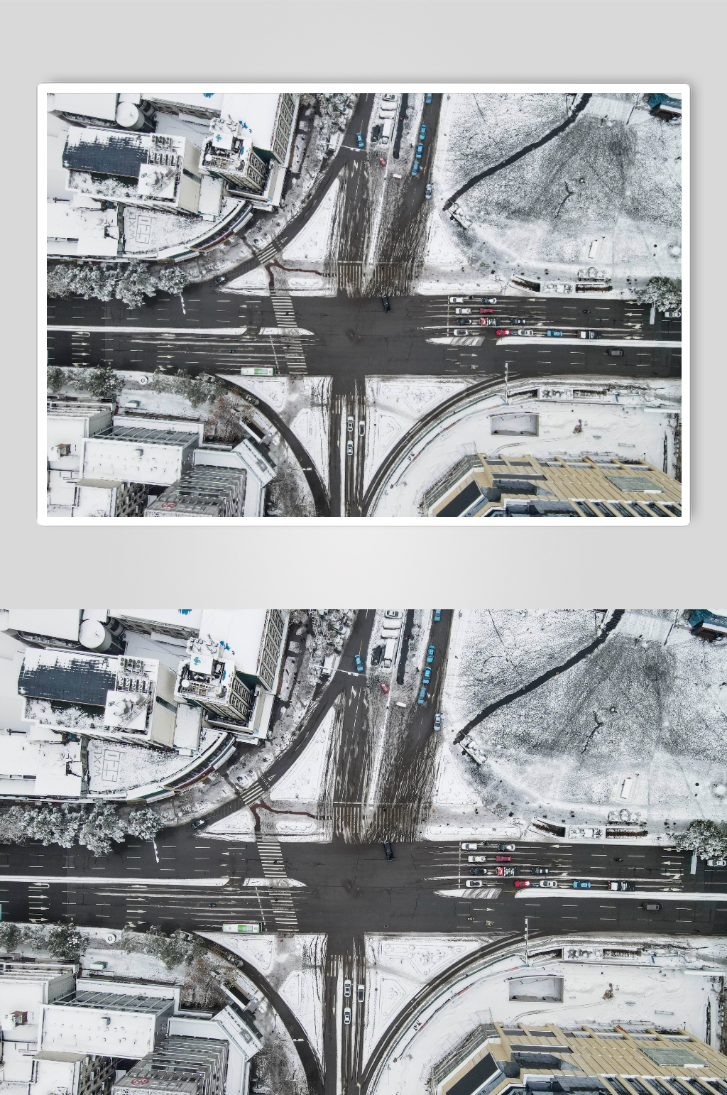 俯拍城市交通雪景车辆行驶摄影图素材