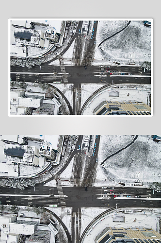 俯拍城市交通雪景车辆行驶摄影图