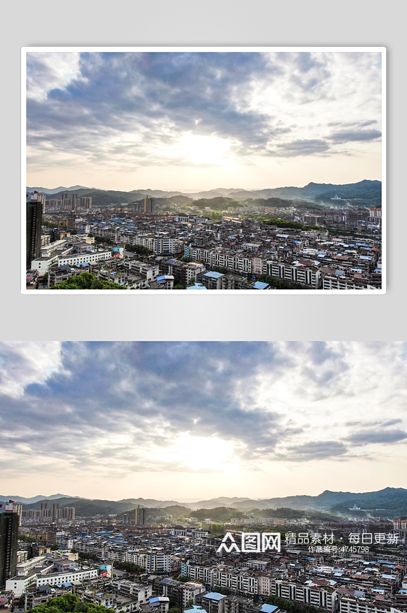 航拍山城城市建设耶稣光蓝天白云摄影图素材