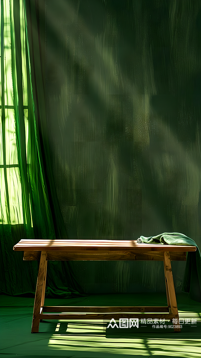 极简舞台风格在绿色布料背景上放着木质桌子素材