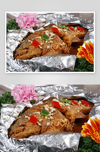 解丝秘制烤鲈鱼美食摄影图片
