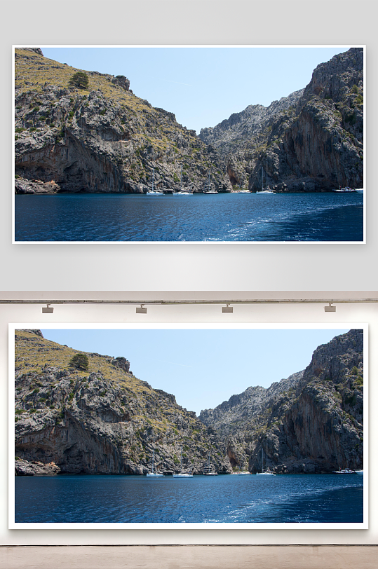 山崖环抱的蓝色海湾与帆船-众图网