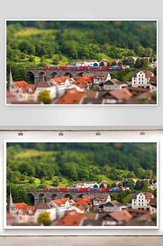 红色列车穿行于小镇桥梁之上-众图网