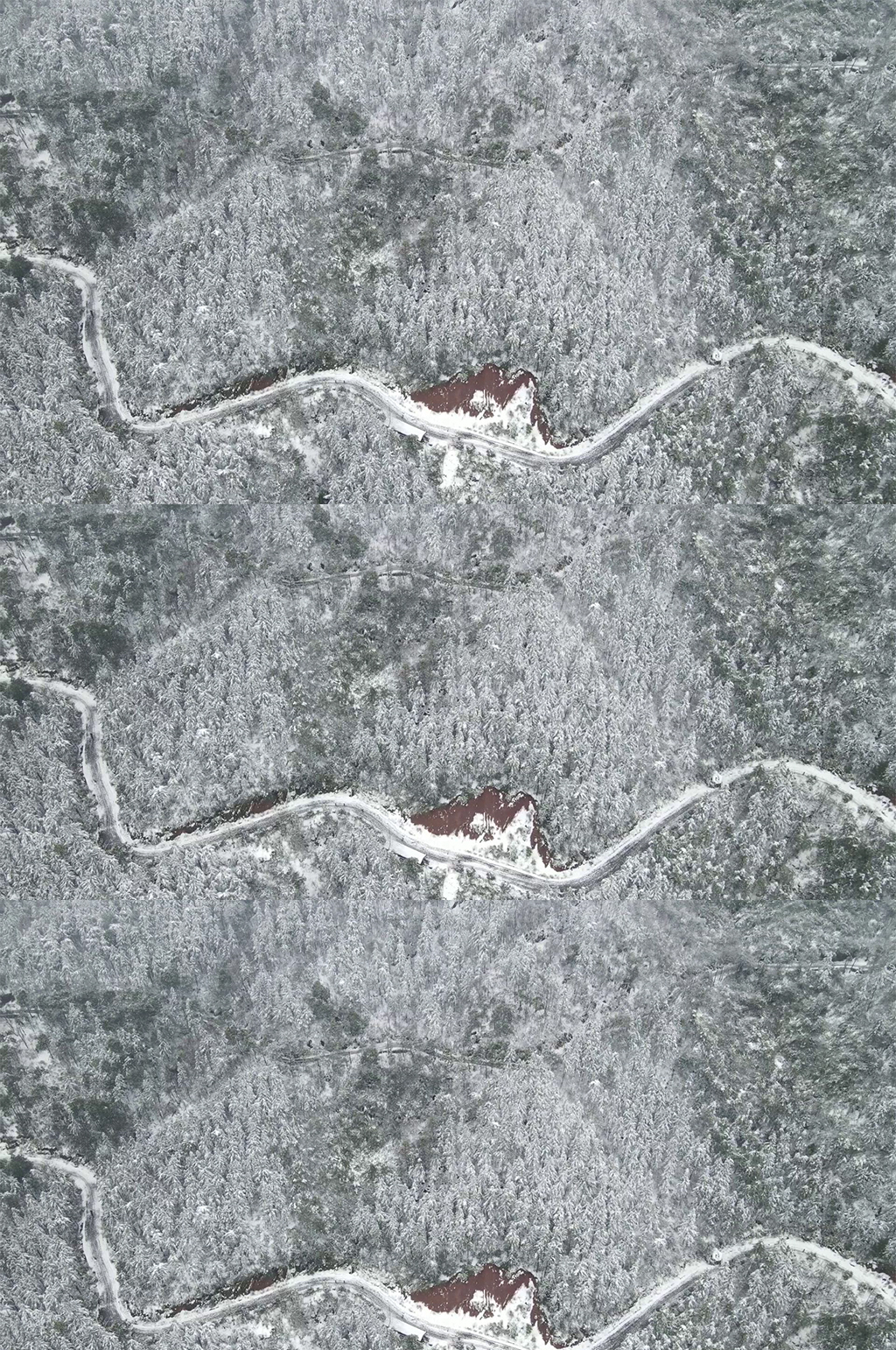 俯拍冬天雪景盘山公路素材