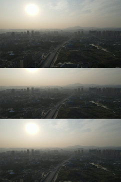 航拍城市清晨迷雾