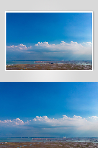 大海沙滩风车蓝天白云航拍摄影图