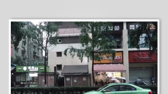 城市街道中的绿色出租车-众图网