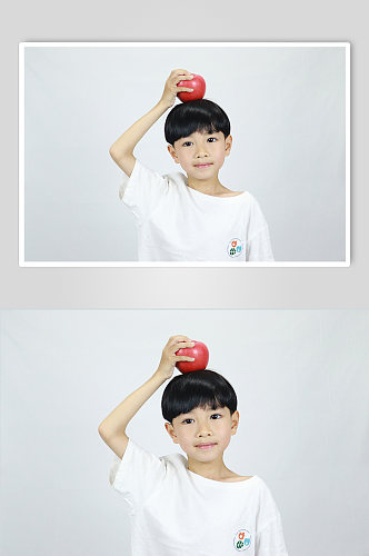 可爱微笑苹果男孩学生儿童节人物摄影照片