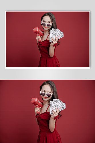 新年女生红裙压岁钱发红包照片摄影图