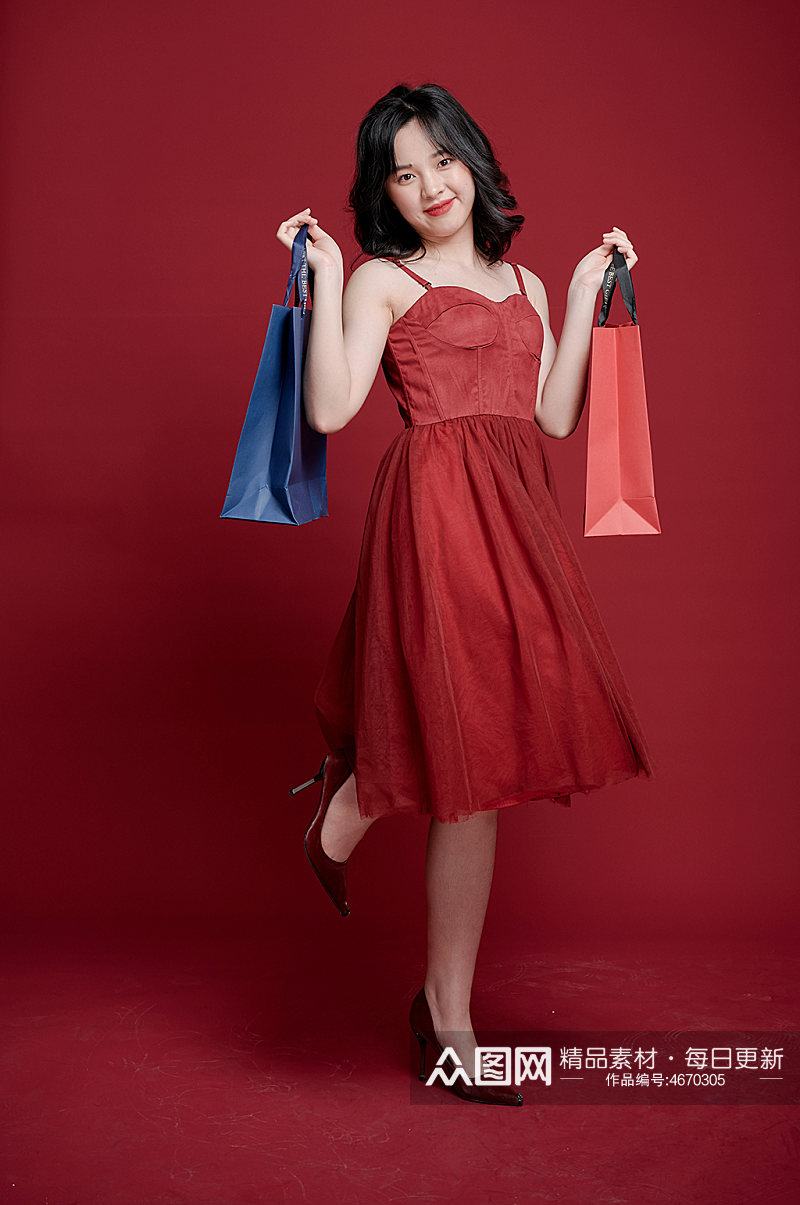 女生红裙购物商城逛街礼物情人节摄影图照片素材