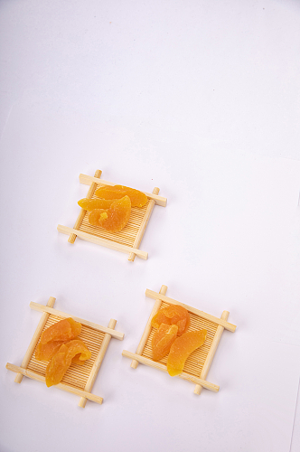 年货果脯蜜饯零食黄桃条摄影图照片