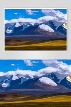 蓝天下的雪山草原摄影图片