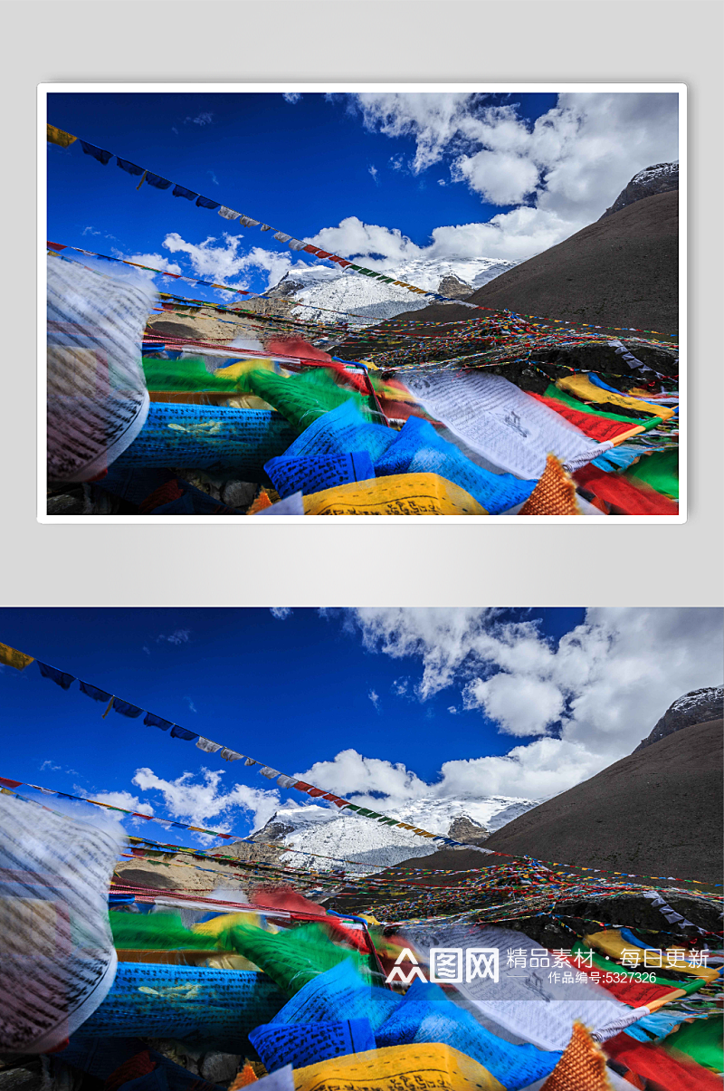 西藏高原雪上上飘动的经幡摄影图片素材