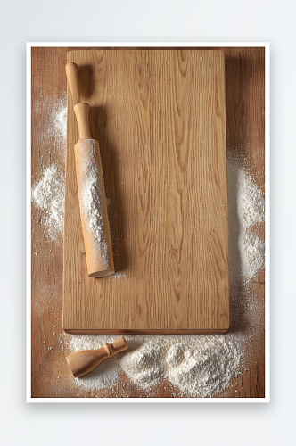 一个撒了面粉木制工作台面一个擀面杖图片