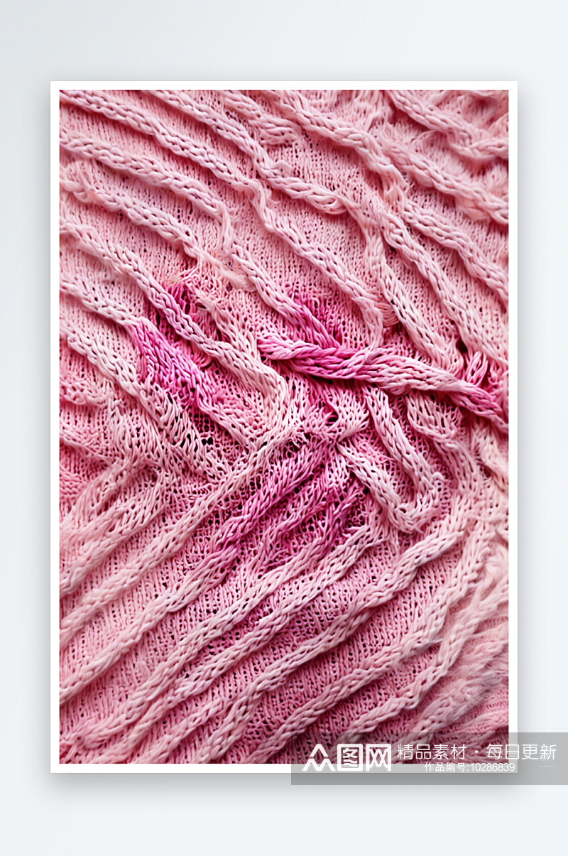粉红色针织面料的质地粉红色的背景照片素材
